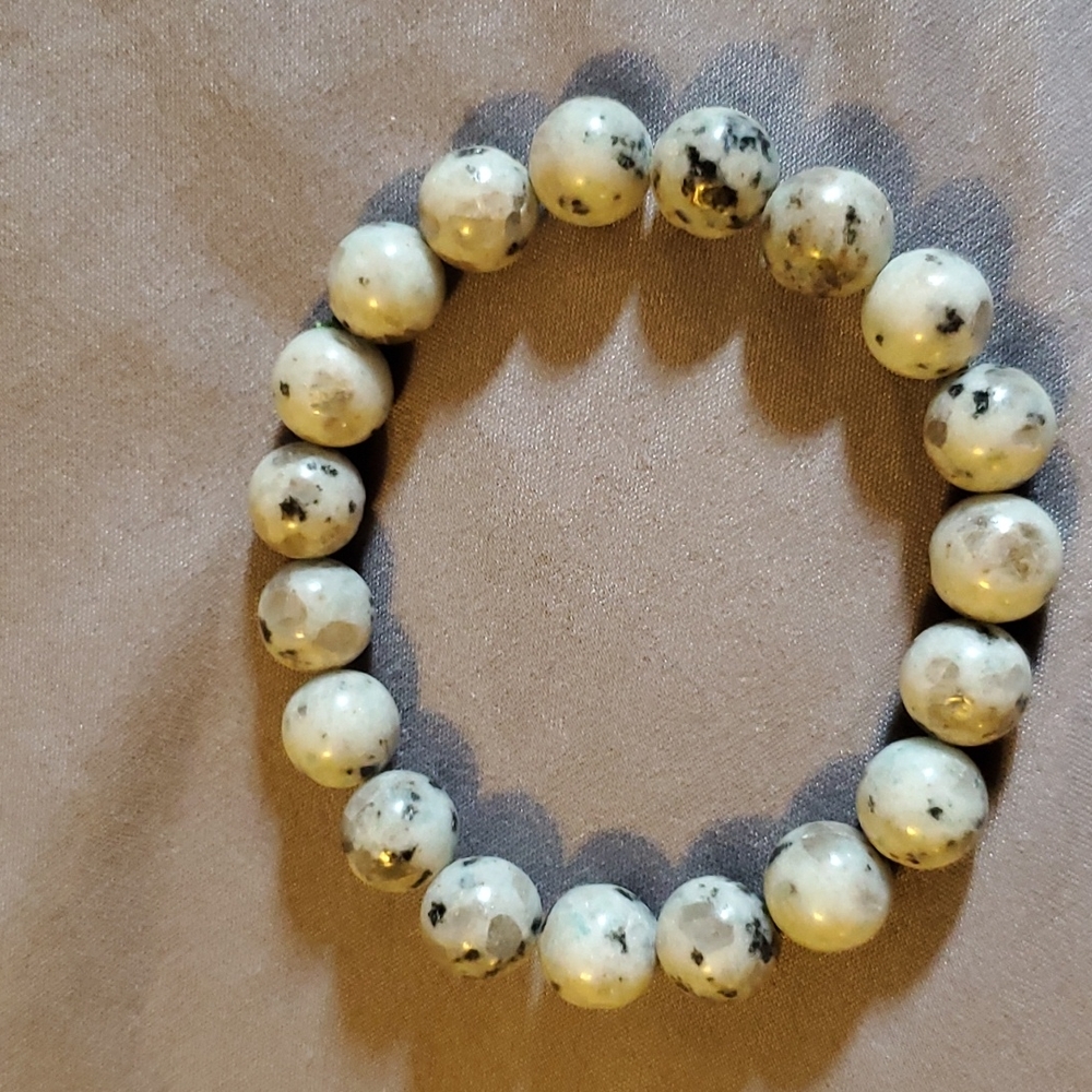 Rainbow moonstone aka kiwi Jasper  10mm . Buy one bracelet get 2nd 20%off